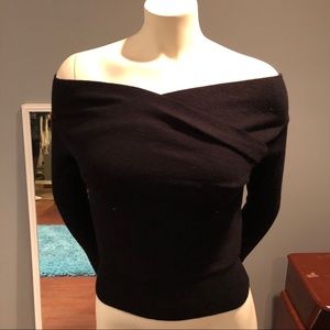 Off the shoulder black long sleeved crop sweater